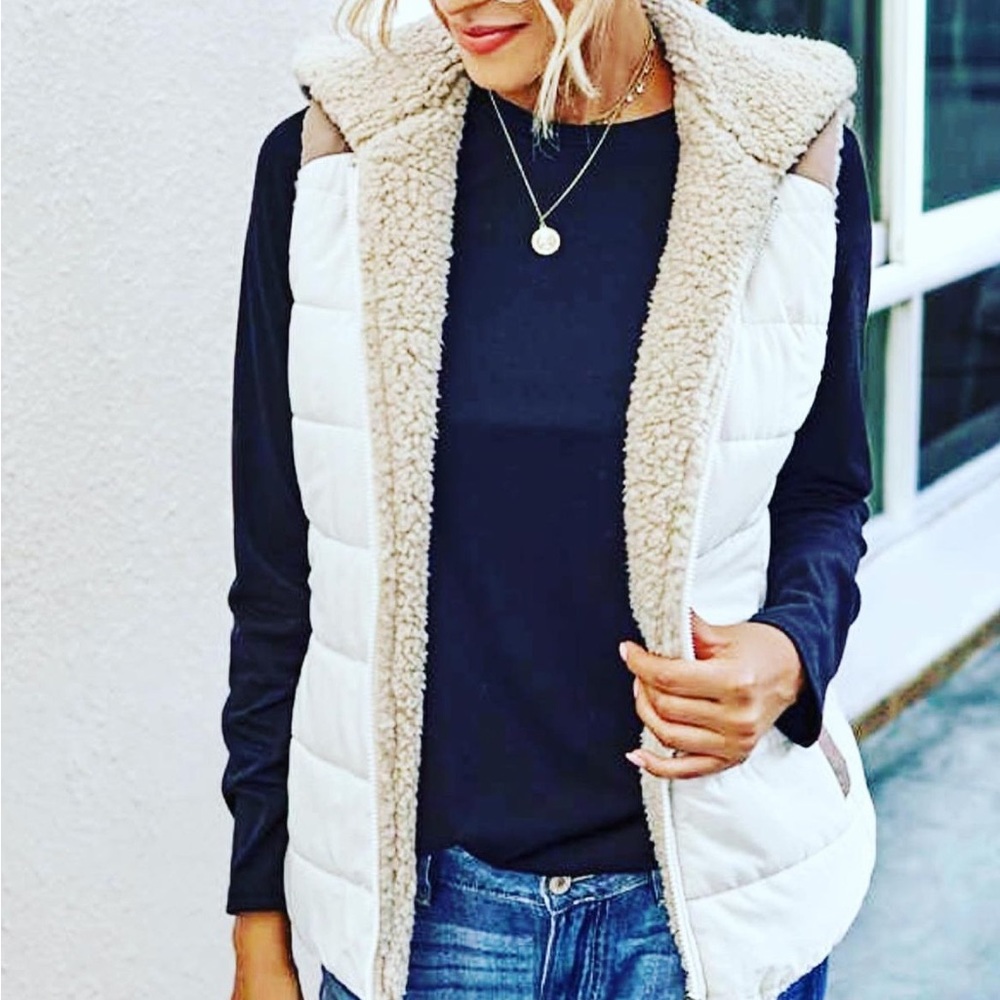 Vest with hood
